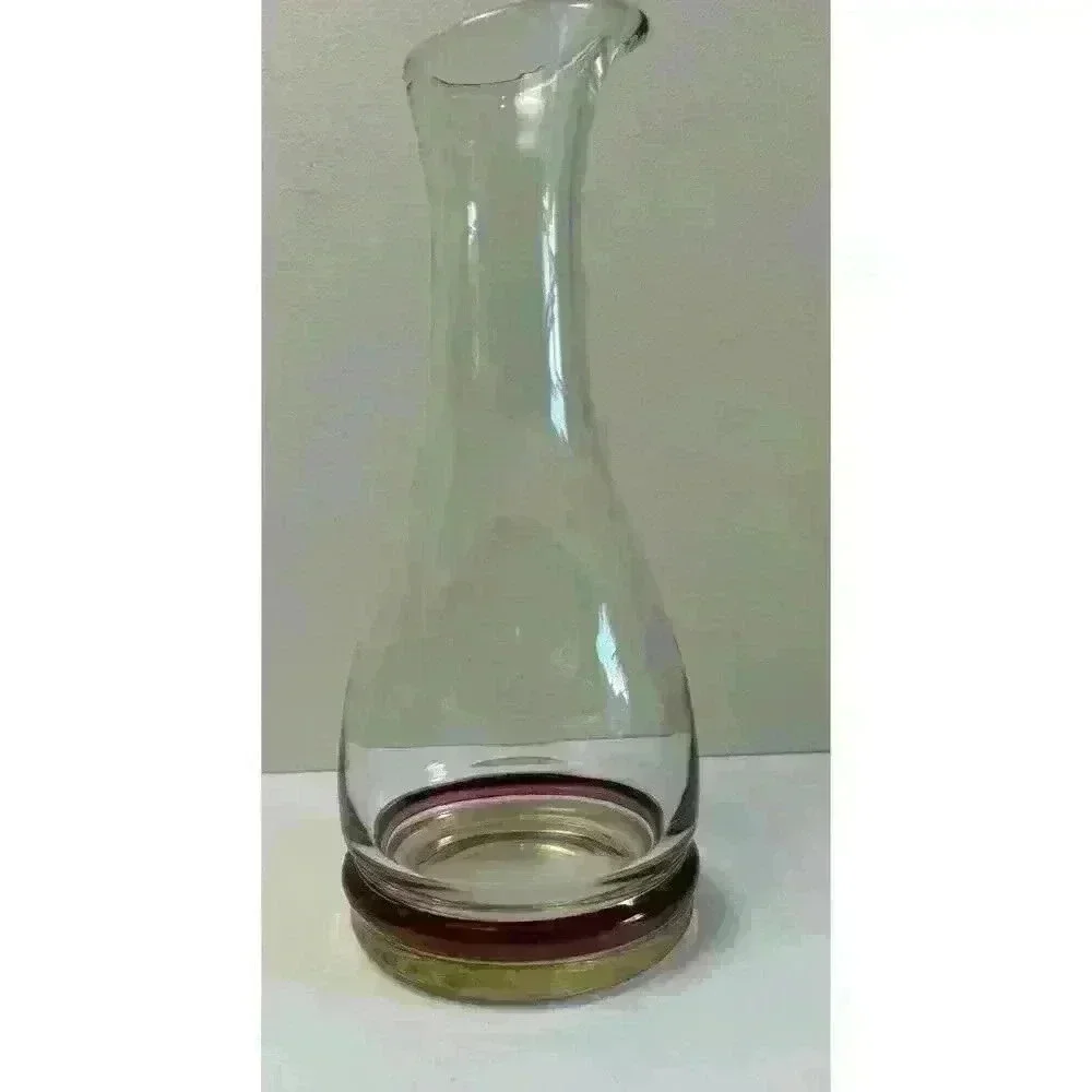 Vintage Glass decanter with cranberry and yellow colored bands on base Beautiful